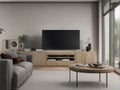 living room with light wooden floor, grey couch and wing back chair and big tv on wall Royalty Free Stock Photo