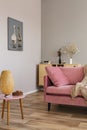 Living room in neutral colors with accents of pink and wood Royalty Free Stock Photo