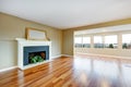 Living room in a new empty house with fireplace. Royalty Free Stock Photo