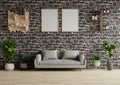 Living room with picture frame on brick wall decorated with shelves sofa and plant pots on the floor.3d rendering Royalty Free Stock Photo