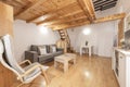 Living room in a pinewood framed duplex apartment accessed