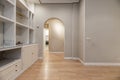 living room with plaster and wood furniture built into the wall Royalty Free Stock Photo