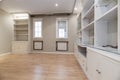 living room with plaster and wood furniture built into the wall Royalty Free Stock Photo