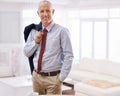 Living room, portrait and mature businessman, happy ceo or senior manager in luxury home. Real estate, confidence or Royalty Free Stock Photo