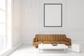Living room with poster, brown sofa and a coffee table Royalty Free Stock Photo