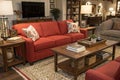 Living room with red sofa and tables Royalty Free Stock Photo
