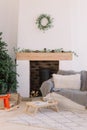 Living room in Scandinavian style with Christmas decor. Holiday background. New Year decorations Royalty Free Stock Photo