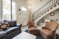 Living room of a single-family home with wooden doors and aluminum