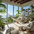 The living room is spacious and bright, with large windows overlooking the ocean, a comfortable armchair, a bookshelf and a