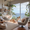 The living room is spacious and bright, with large windows overlooking the ocean, a comfortable chair and a hammock for relaxation