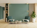Living room with two green armchair on empty dark green wall background Royalty Free Stock Photo