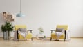 Living room with two yellow armchair on empty white wall background Royalty Free Stock Photo