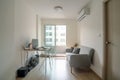 Living room with working area in apartment Royalty Free Stock Photo