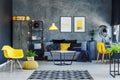 Living room with yellow pouf