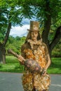 A living sculpture. The actor is working in the Park.