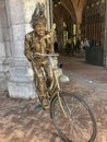 Living statue in bronze posed in front of Rijksmuseum, Amsterdam