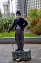 Living statue Charlie Chaplin on London`s waterfront Royalty Free Stock Photo