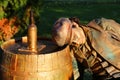 Living statue - sleeping near bottle