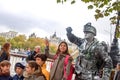 Living statue of a soldier on London`s waterfront Royalty Free Stock Photo