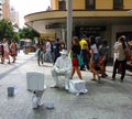 Living statue street performer on sidewalk - fisherman fishing in a toliet - Brisbane Queensland Australia November 23 2013