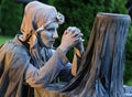 Living statue - woman praying