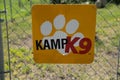 Sign for a Kamp K9 - a dog play area at a KOA Kampgrounds of America