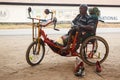 LIVINGSTONE - OCTOBER 14 2013: Local disabled man with an adapted wheelchair sets up successful shoe repair business in Royalty Free Stock Photo