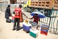 LIVINGSTONE - OCTOBER 14 2013: Street vendors continue to sell t