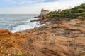 Livorno, Italy - Boccale Castle, seascape sunset. Rock and sea water