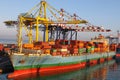 Container terminal with stowed containers from different shippers gantry cranes and straddle carriers