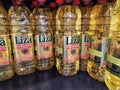 Liza sunflower oil bottles on a supermarket shelf. Liza oil, a brand by Cargill Brazil. Vegetal oil bottles.