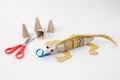 Lizard craft using recycled materials, egg cartons and cardboard, step-by-step guide, eco-friendly, DIY project, vibrant Royalty Free Stock Photo