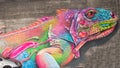 Lizard Graffiti, colorful lizard in all rainbow colors on dirty wall under highway