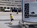 Ljubljana, a boy with a scooter Royalty Free Stock Photo