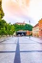 Ljubljana city street, look to castle on the hill. Tourism in the Slovenia capital. Royalty Free Stock Photo