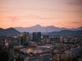 Ljubljana cityscape at sunset with mountains in the background