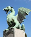 Ljubljana, L, Slovenia - August 15, 2023: Winged dragon symbol of city on the bridge called zmajski most in slovenian language