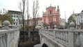 Triple Bridge and the river citscape