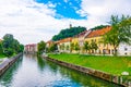 Ljubljana old town center, view of Ljubljanica river in city center. Old building historic panorama. Look to old bridge with touri