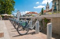 Ljubljana, Slovenia - June 7, 2016 Bicycle sharing system, called Bicikelj and St. Nicholas church in the background