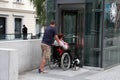 LJUBLJANA, SLOVENIA - JUNE 28, 2014: Husband and wife in a whee