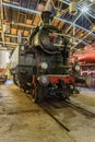 Old steam train engine parked in the railway museum Royalty Free Stock Photo