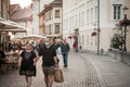 Selective blur on young man and woman, couple, one wearing a facemask the other not, Royalty Free Stock Photo