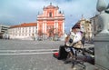 Ljubljana, Slovenia - March 22, 2020 Only street artist playing on Preseren square on spring Sunday morning