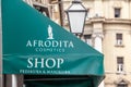 Afrodita Cosmetics logo in front of their retailer for Ljubljana.