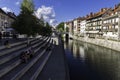 Ljubljanica River as it passes through the Cobblers Bridge in the city of Ljubljana, Slovenia Royalty Free Stock Photo