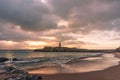 The Llanddwyn island lighthouse, Goleudy Twr Bach at Ynys Llanddwyn on Anglesey, North Wales Royalty Free Stock Photo