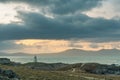 The Llanddwyn island lighthouse, Goleudy Twr Bach at Ynys Llanddwyn on Anglesey, North Wales Royalty Free Stock Photo