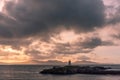 The Llanddwyn island lighthouse, Goleudy Twr Bach at Ynys Llanddwyn on Anglesey, North Wales Royalty Free Stock Photo