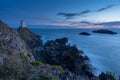 The Llanddwyn island lighthouse, Twr Mawr at Ynys Llanddwyn on Anglesey, North Wales Royalty Free Stock Photo